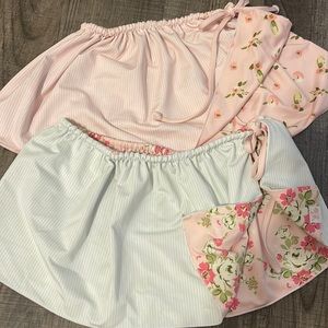 2 reversible sweet honey leotard skirts that tie. Fit like kids 8-10.
